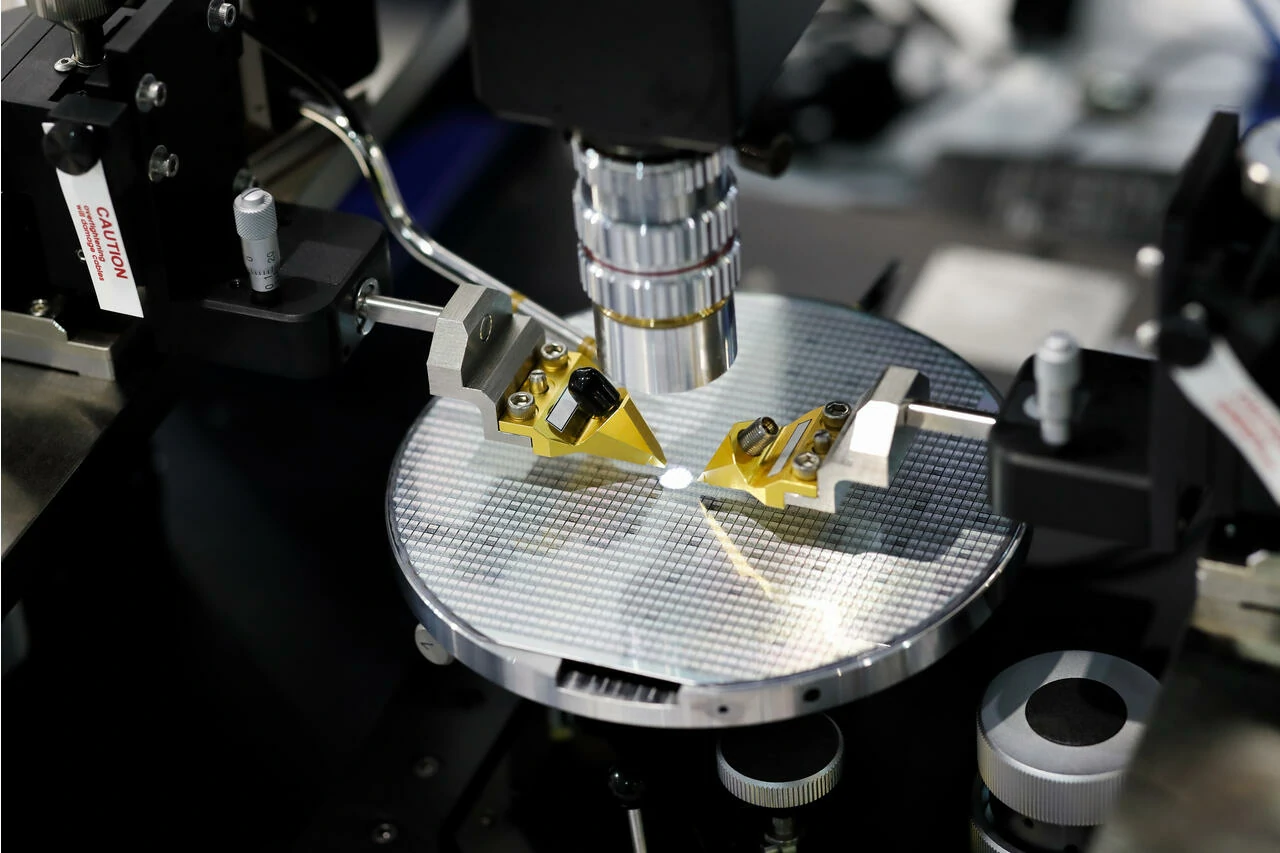 Microfabrication process with advanced machinery inspecting a silicon wafer